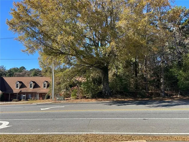 a view of an outdoor space and basketball court