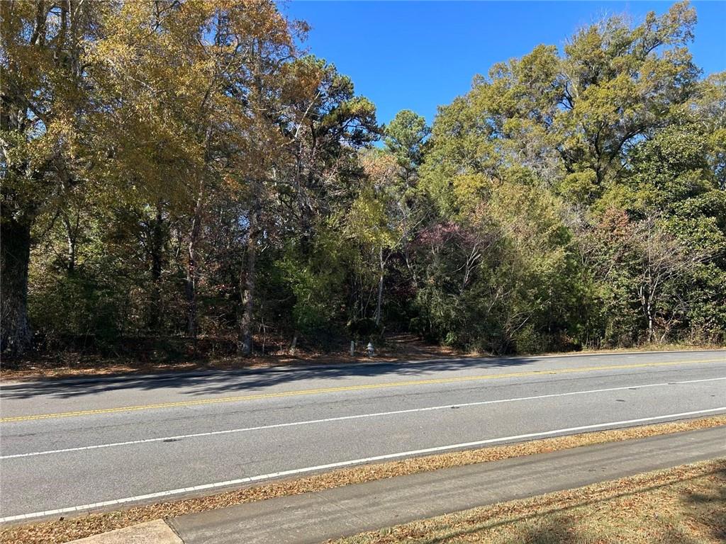 1471 Bells Ferry Road Marietta, GA 30066 - Photo 3 of 17 a view of a houses with a yard