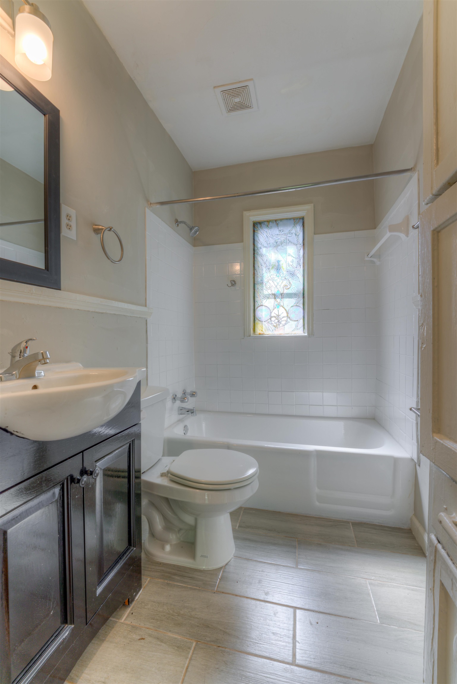 777 Loeb Street Memphis, TN 38111 - Photo 22 of 22 a bathroom with a sink a toilet and bathtub