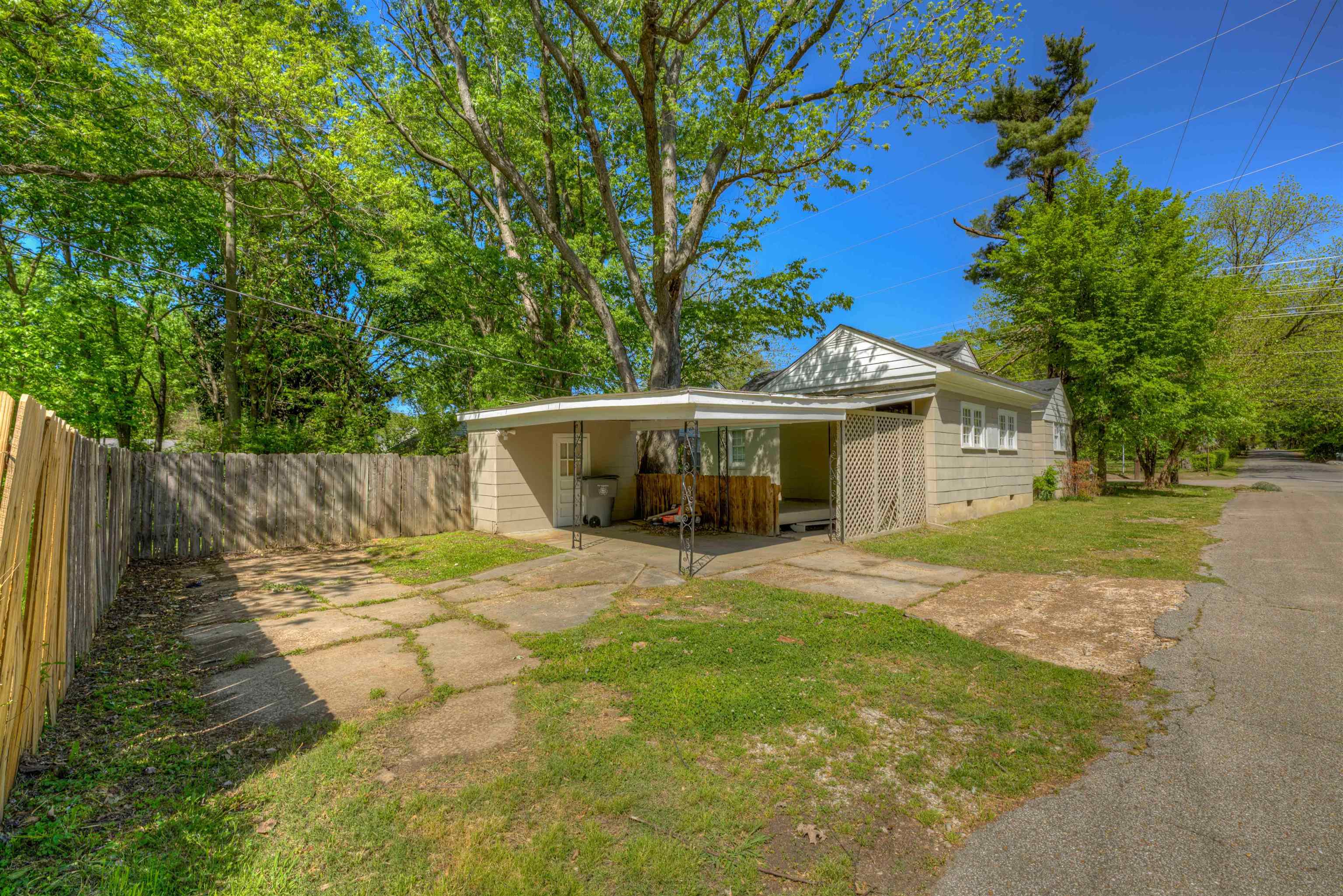 777 Loeb Street Memphis, TN 38111 - Photo 5 of 22 a view of a house with backyard and a tree
