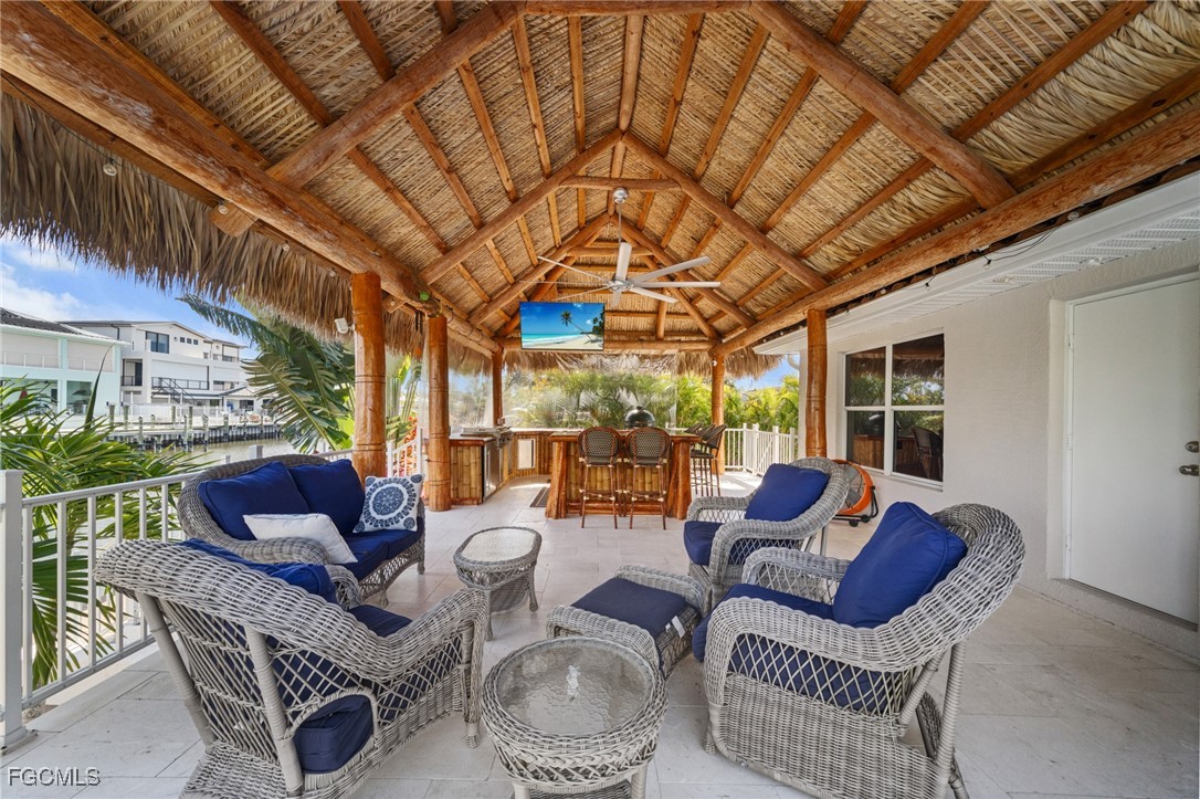 12234 Boat Shell Drive Matlacha Isles, FL 33991 - Photo 2 of 50 a outdoor living space with furniture and garden view