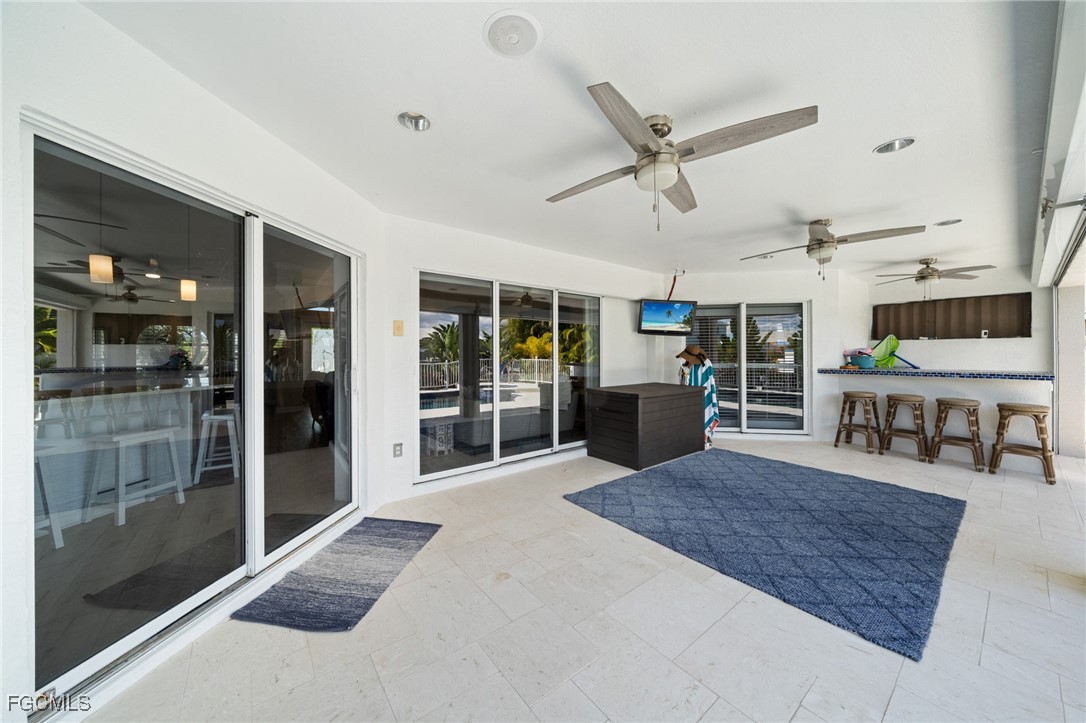 12234 Boat Shell Drive Matlacha Isles, FL 33991 - Photo 25 of 50 a living room with lots of furniture and a large window