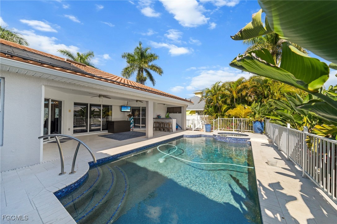 12234 Boat Shell Drive Matlacha Isles, FL 33991 - Photo 28 of 50 a view of a house with a swimming pool