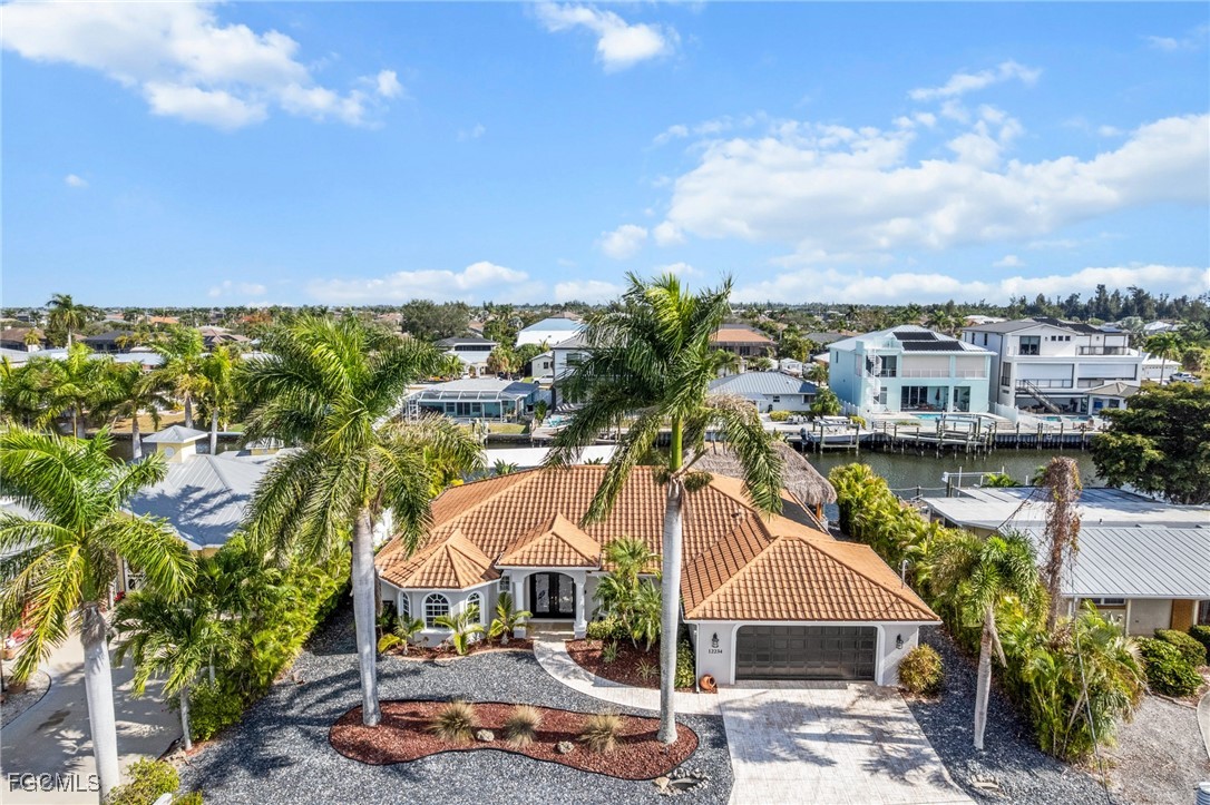 12234 Boat Shell Drive Matlacha Isles, FL 33991 - Photo 37 of 50 a aerial view of a house