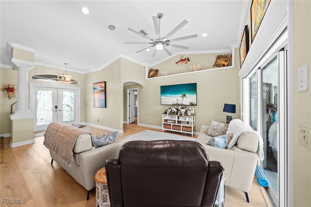 12234 Boat Shell Drive Matlacha Isles, FL 33991 - Photo 8 of 50 a bedroom with furniture and a large window