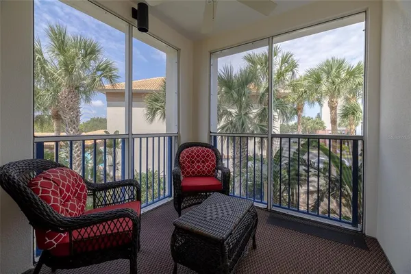 a view of a balcony with chair