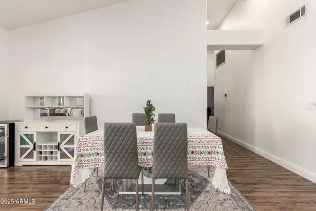 a view of a livingroom with furniture and wooden floor