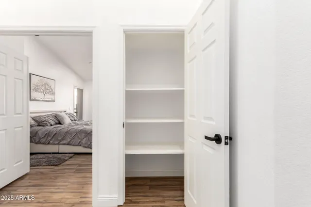 a living room with furniture and a gate