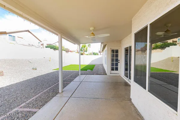 a view of a park with large trees