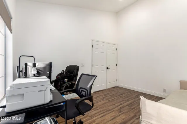 a view of workspace with lounge chair