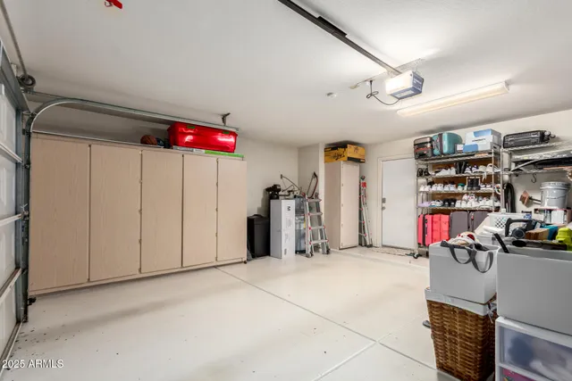 a view of a garage with storage