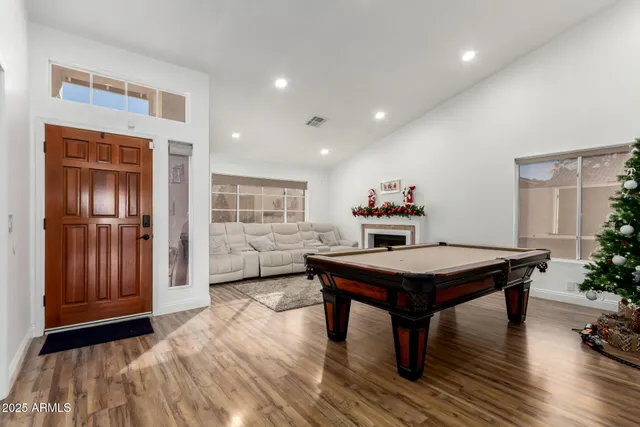 a room with furniture and wooden floor