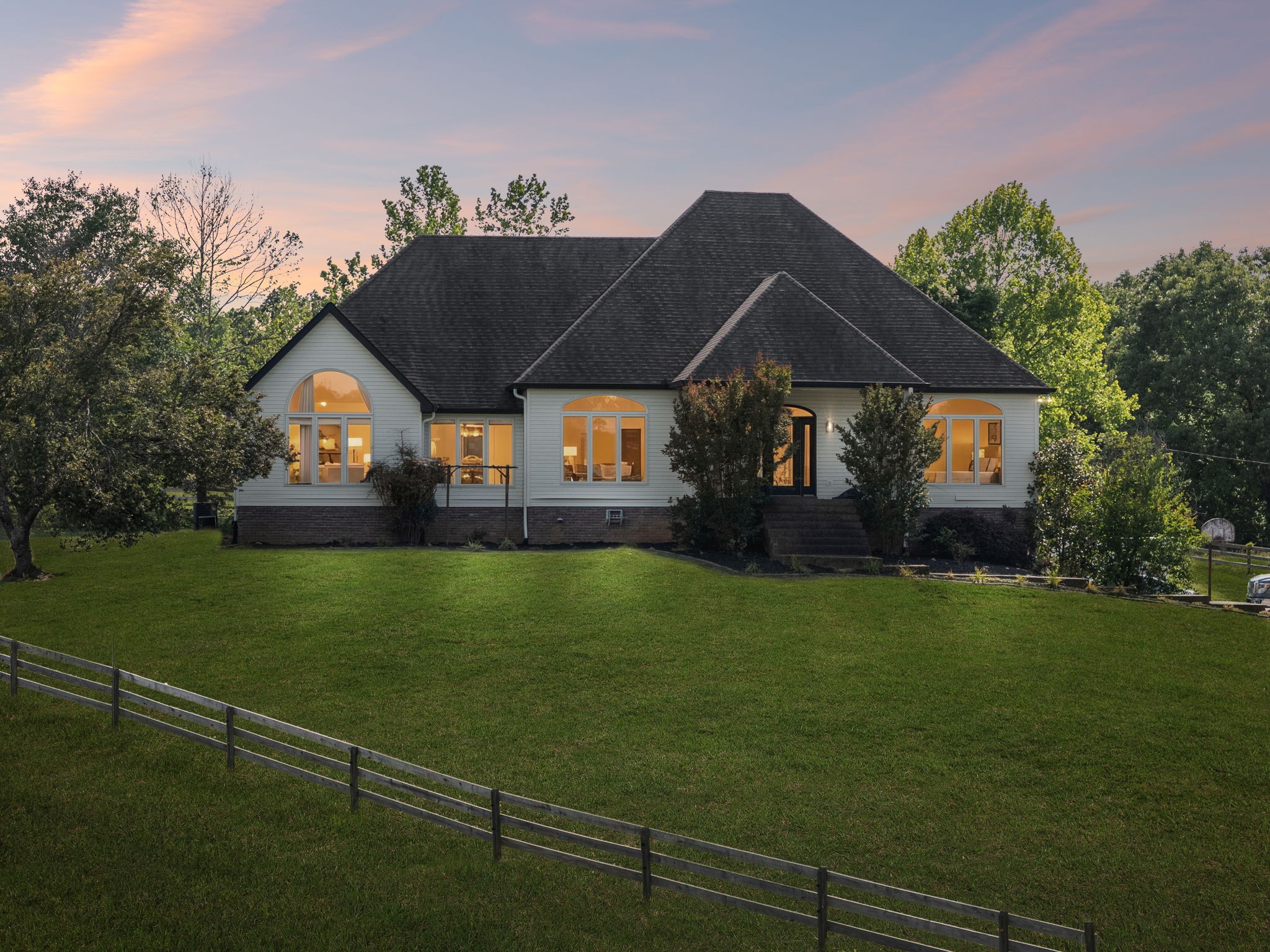 250 Home Pl Road Dickson, TN 37055 - Photo 2 of 62 a front view of a house with a garden
