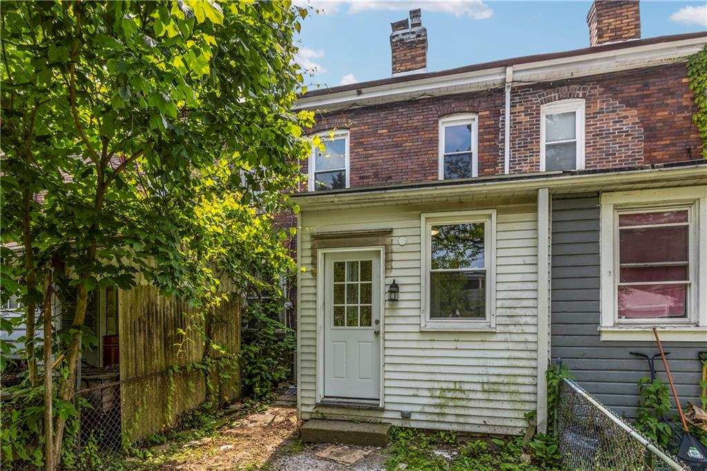 1238 Church Avenue McKees Rocks, PA 15136 - Photo 24 of 25 a front view of a house with a yard