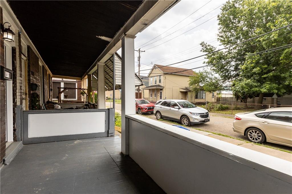 1238 Church Avenue McKees Rocks, PA 15136 - Photo 3 of 25 a view of a cars park in front of a building