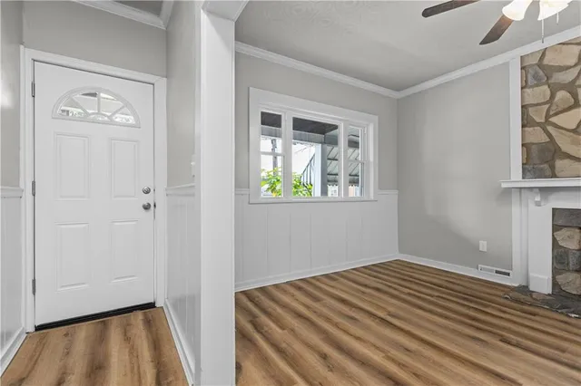 a bedroom with bed and hallway