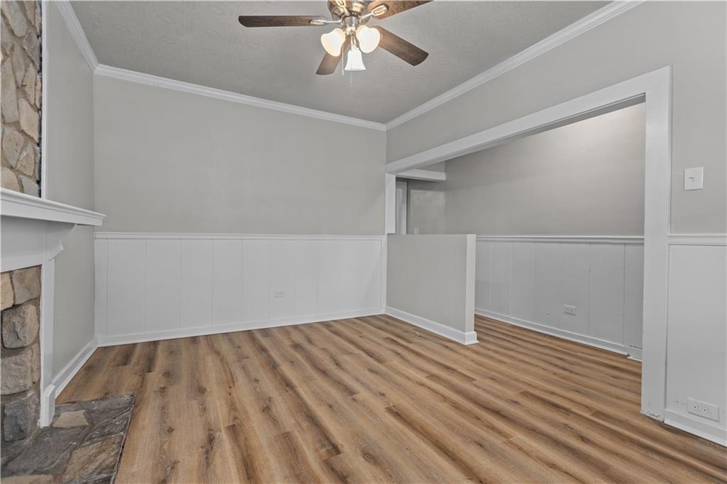 1238 Church Avenue McKees Rocks, PA 15136 - Photo 7 of 25 wooden floor in an empty room with a window