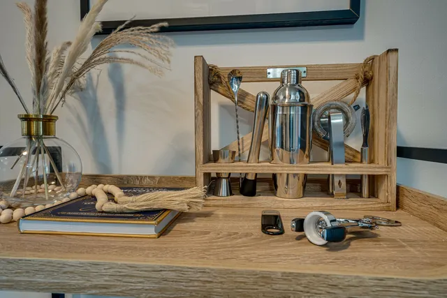 a kitchen with stainless steel appliances granite countertop a stove and a microwave