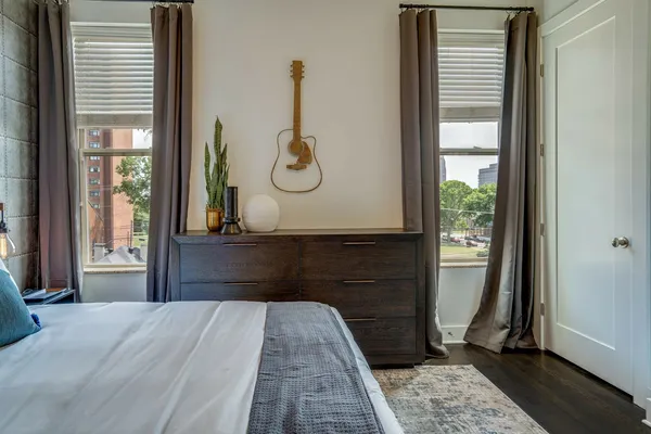 a bathroom with a bathtub and toilet