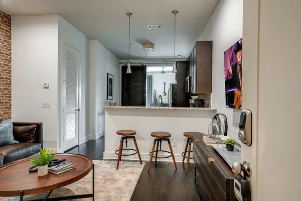 a view of a kitchen and dining room