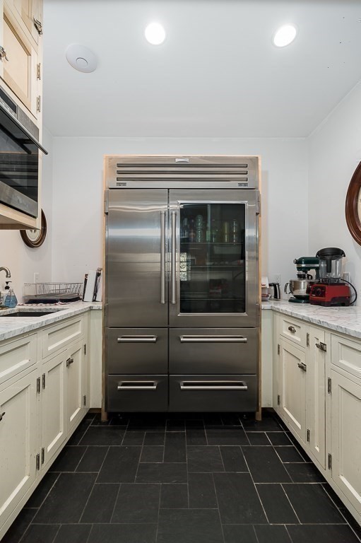 13 Main Street Boxford, MA 01921 - Photo 11 of 36 a kitchen with a cabinets and appliances