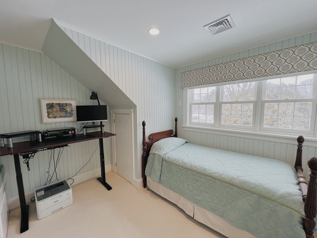 13 Main Street Boxford, MA 01921 - Photo 22 of 36 a bedroom with a bed and a television
