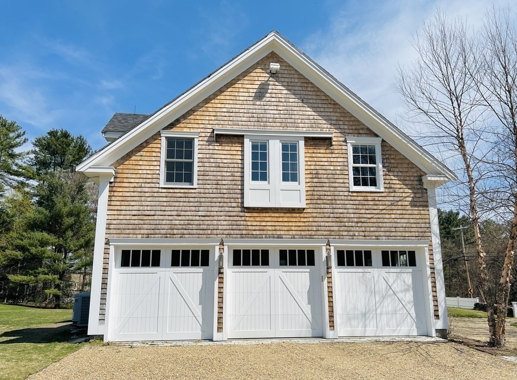 13 Main Street Boxford, MA 01921 - Photo 30 of 36 a front view of a house with a yard