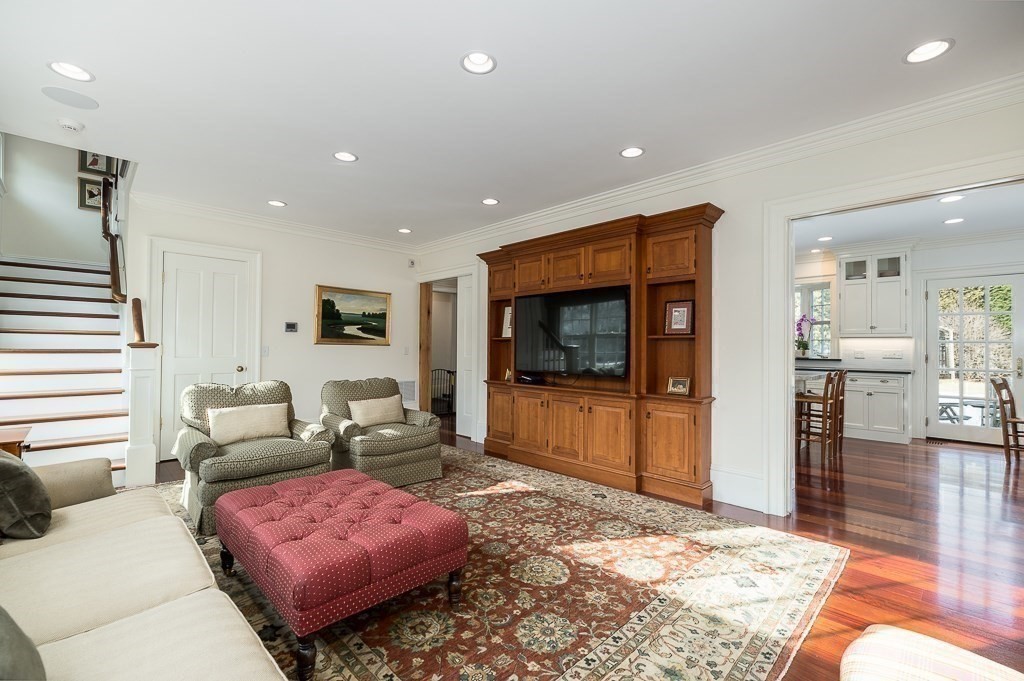 13 Main Street Boxford, MA 01921 - Photo 5 of 36 a living room with furniture and a flat screen tv