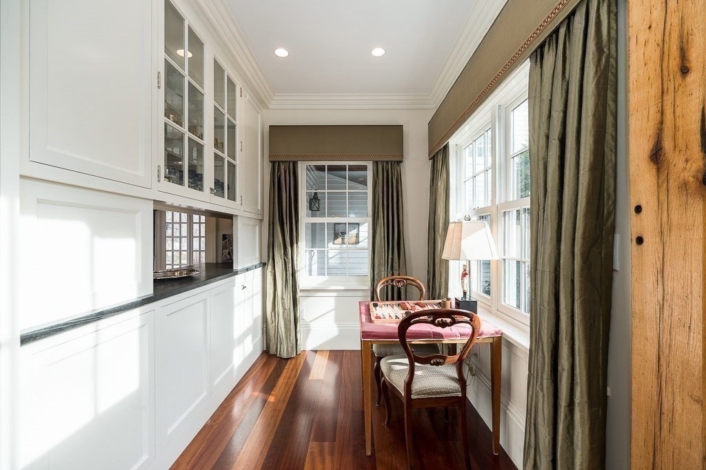 13 Main Street Boxford, MA 01921 - Photo 6 of 36 a living room with furniture and a large window