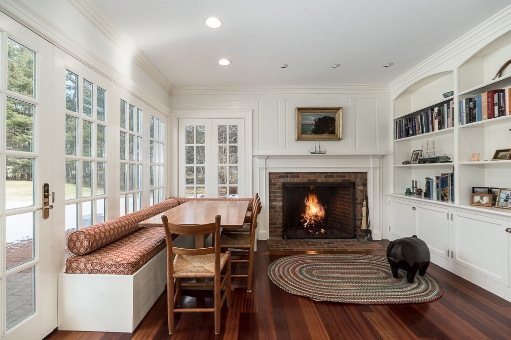13 Main Street Boxford, MA 01921 - Photo 10 of 36 a living room with furniture and a fireplace