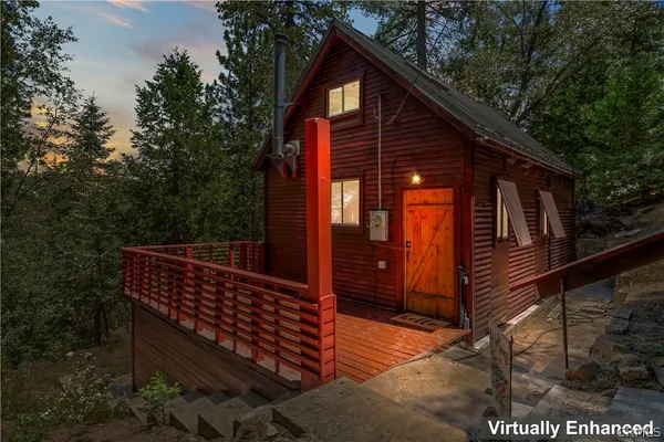a view of outdoor space with deck and yard
