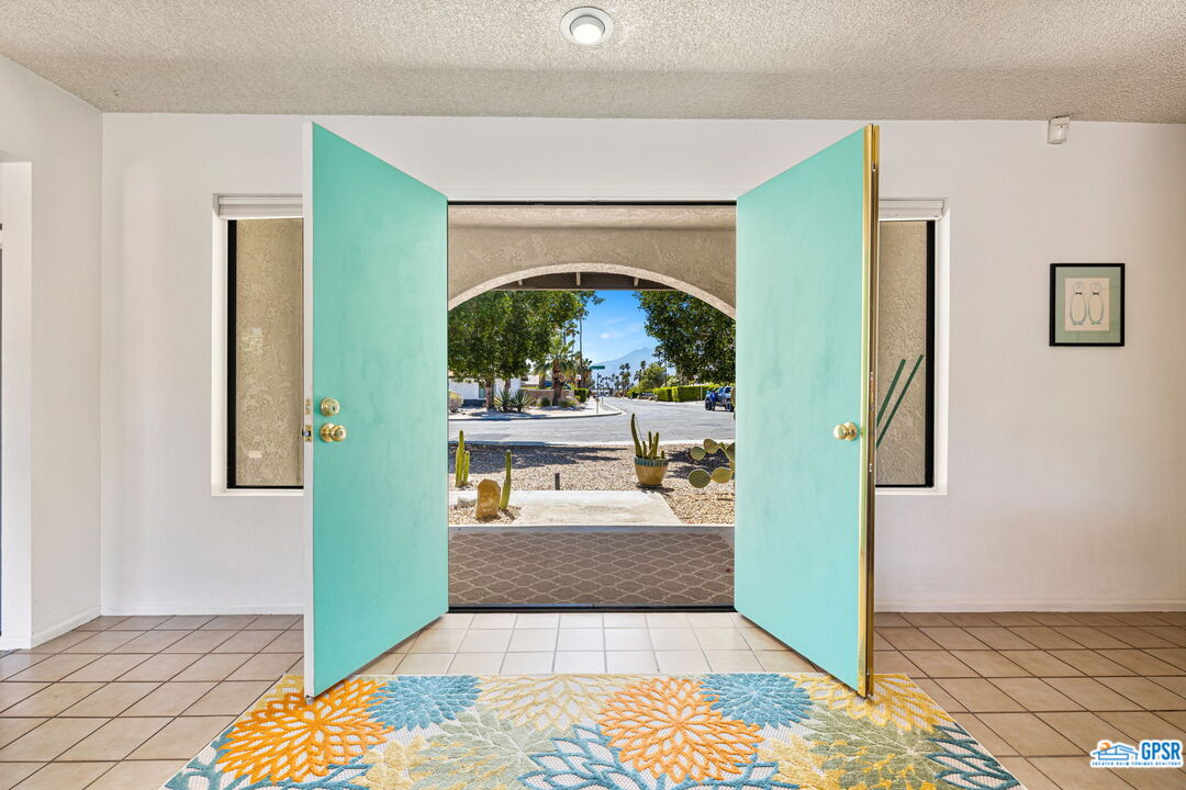 1250 East Delgado Road Palm Springs, CA 92262 - Photo 12 of 35 a view of living room with furniture and a rug