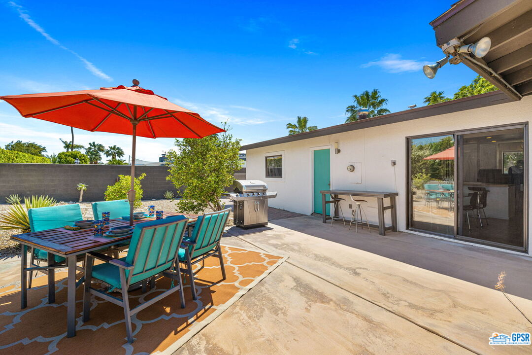 1250 East Delgado Road Palm Springs, CA 92262 - Photo 20 of 35 a view of a backyard with sitting area and furniture