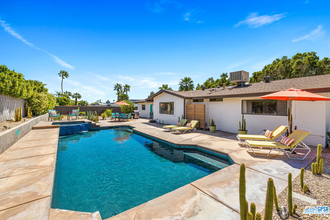 1250 East Delgado Road Palm Springs, CA 92262 - Photo 2 of 35 a view of a house with backyard porch and sitting area
