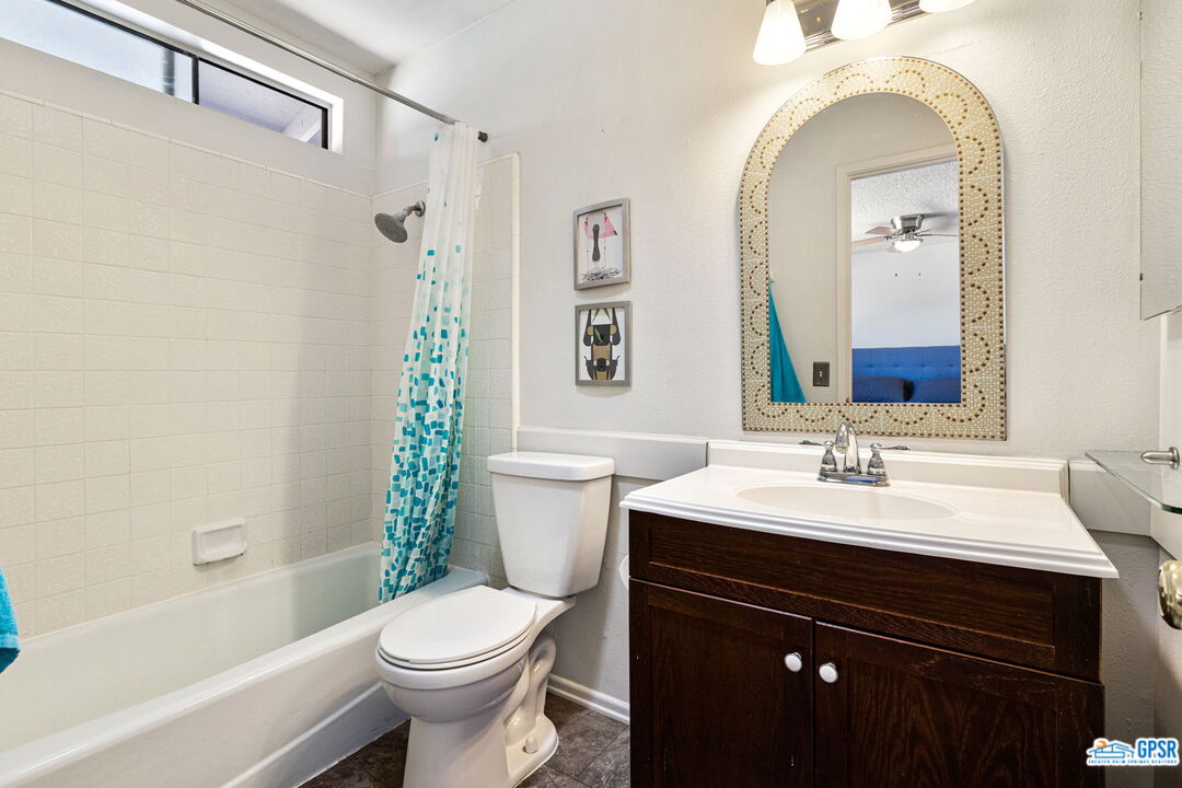 1250 East Delgado Road Palm Springs, CA 92262 - Photo 27 of 35 a bathroom with a sink a toilet and shower