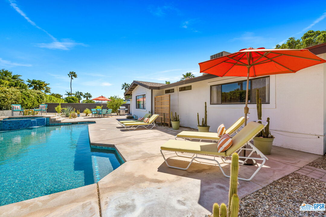 1250 East Delgado Road Palm Springs, CA 92262 - Photo 3 of 35 a view of swimming pool with a patio