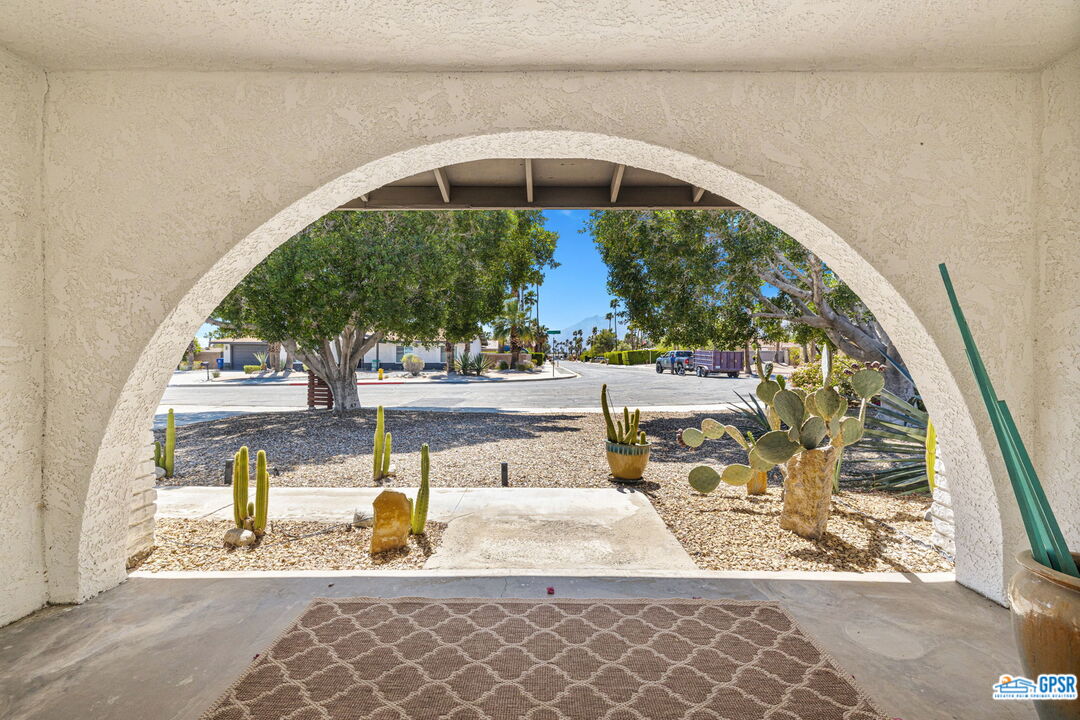 1250 East Delgado Road Palm Springs, CA 92262 - Photo 34 of 35 a view of a swimming pool with a patio