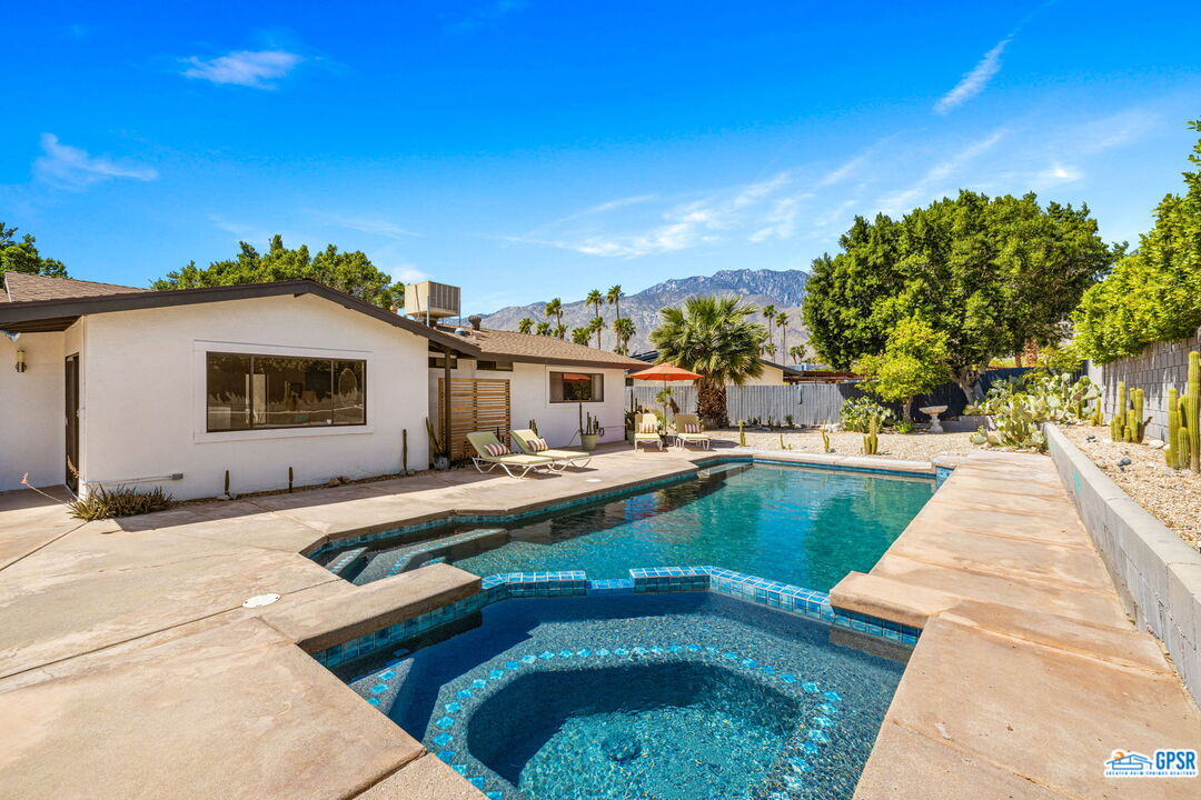 1250 East Delgado Road Palm Springs, CA 92262 - Photo 6 of 35 a swimming pool with outdoor seating and yard