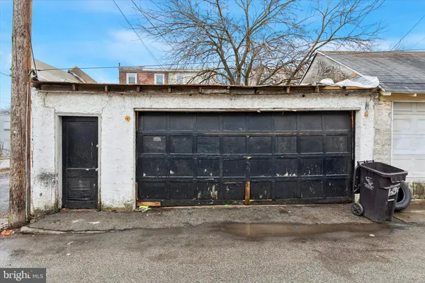 a front view of a house with parking space