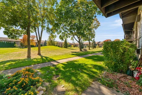 a view of a playground with a patio