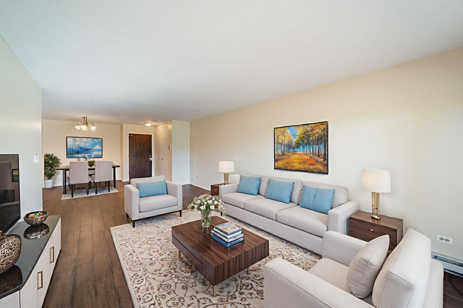 826 East Old Willow Road, Unit 103 Prospect Heights, IL 60070 - Photo 3 of 25 a living room with furniture and a couch