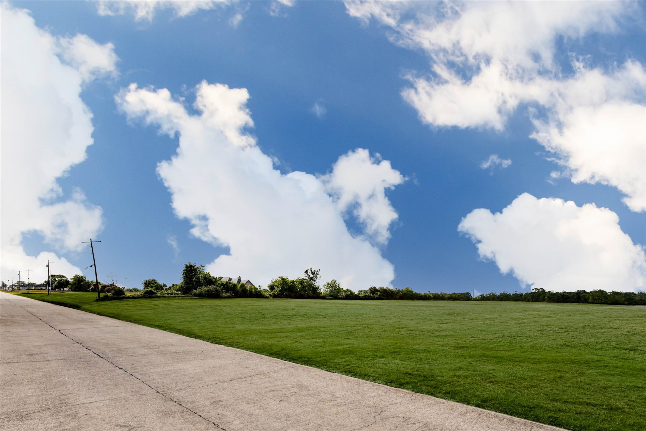 913 Buffalo Trail Angleton, TX 77515 - Photo 12 of 17 a view of a lake and yard