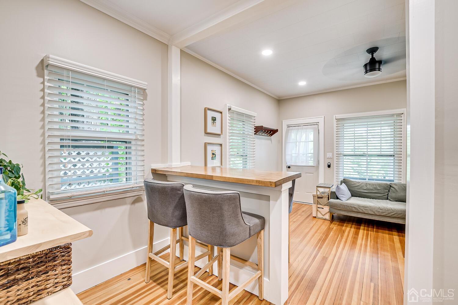 2015 Washington Valley Road Bridgewater, NJ 08836 - Photo 15 of 46 a living room with furniture and a wooden floor