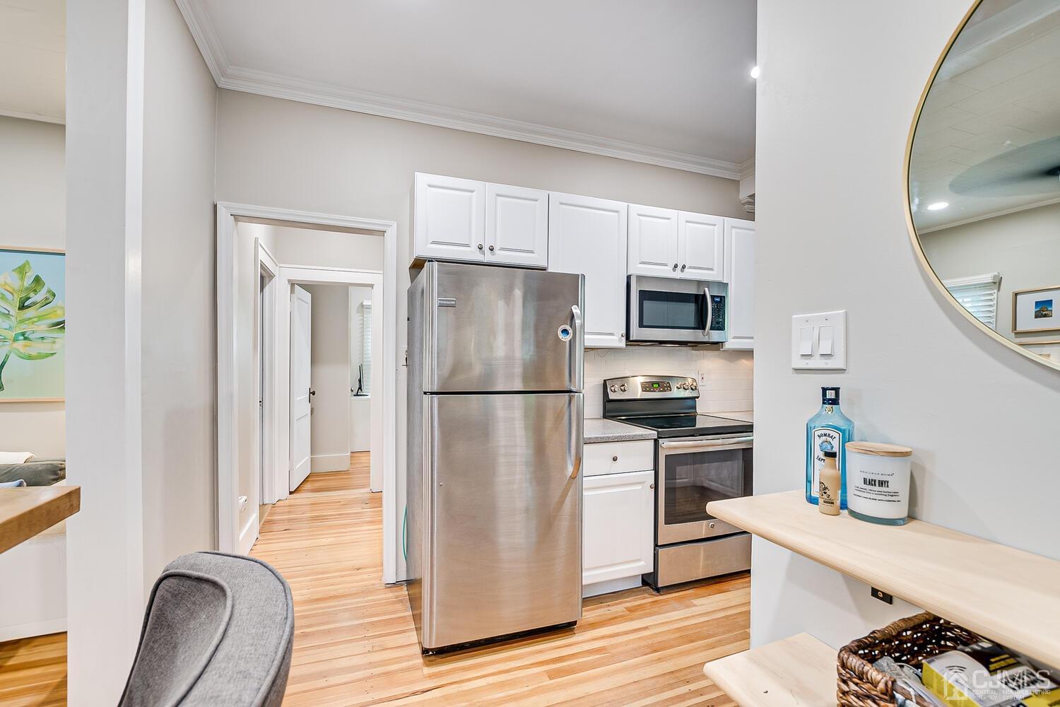 2015 Washington Valley Road Bridgewater, NJ 08836 - Photo 16 of 46 a kitchen with stainless steel appliances a refrigerator stove and sink