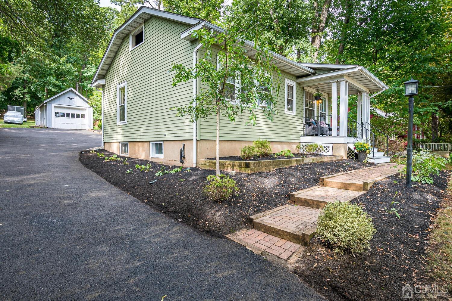 2015 Washington Valley Road Bridgewater, NJ 08836 - Photo 2 of 46 a front view of a house with garden
