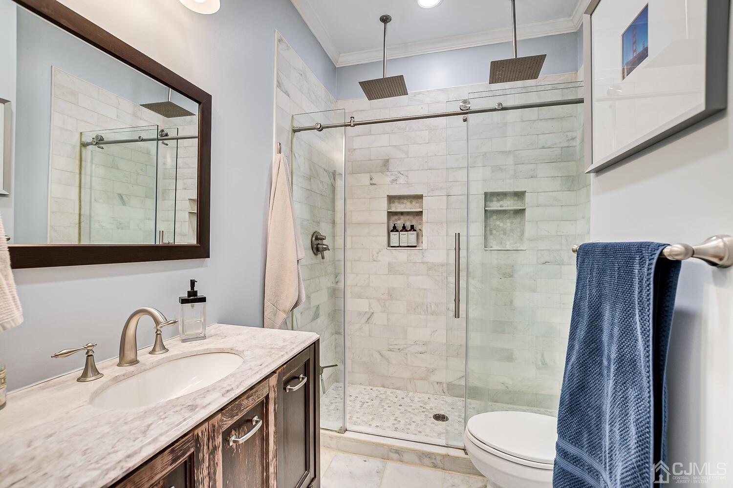 2015 Washington Valley Road Bridgewater, NJ 08836 - Photo 22 of 46 a bathroom with a granite countertop sink toilet and shower