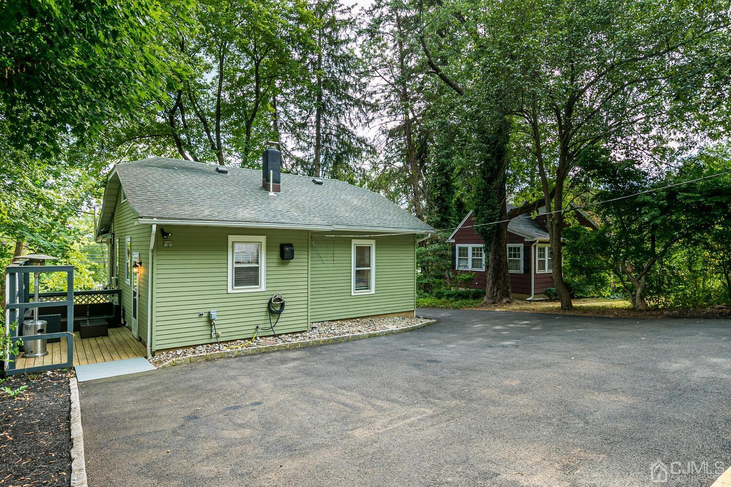 2015 Washington Valley Road Bridgewater, NJ 08836 - Photo 35 of 46 a front view of a house with a garden