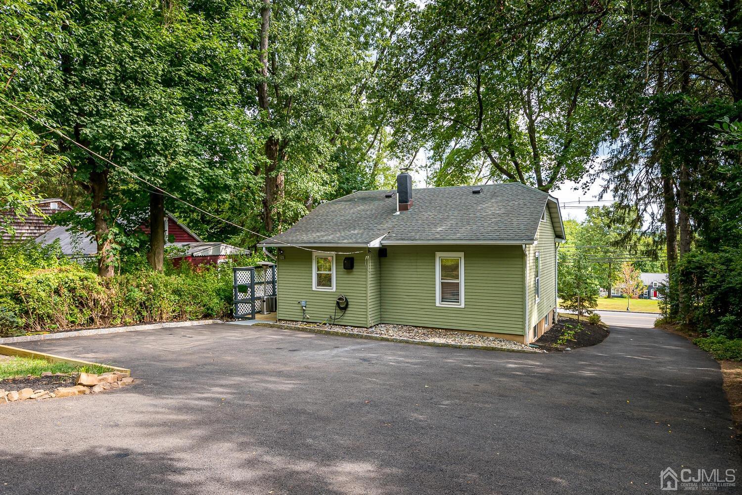 2015 Washington Valley Road Bridgewater, NJ 08836 - Photo 36 of 46 a front view of a house with a garden