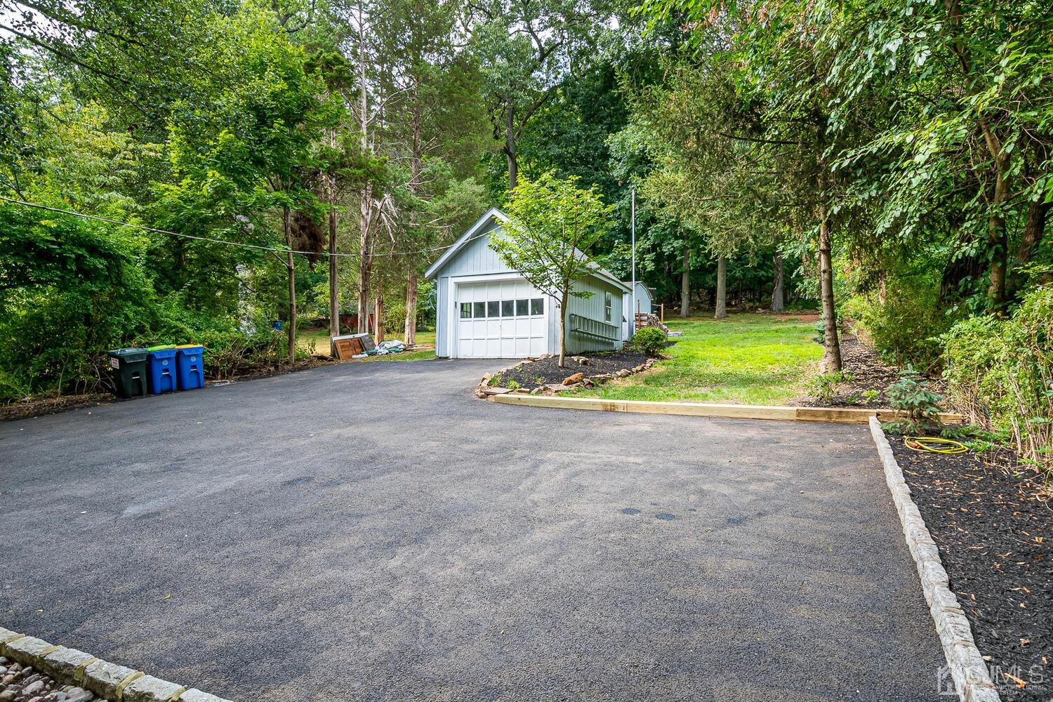 2015 Washington Valley Road Bridgewater, NJ 08836 - Photo 38 of 46 a view of a house with backyard and trees