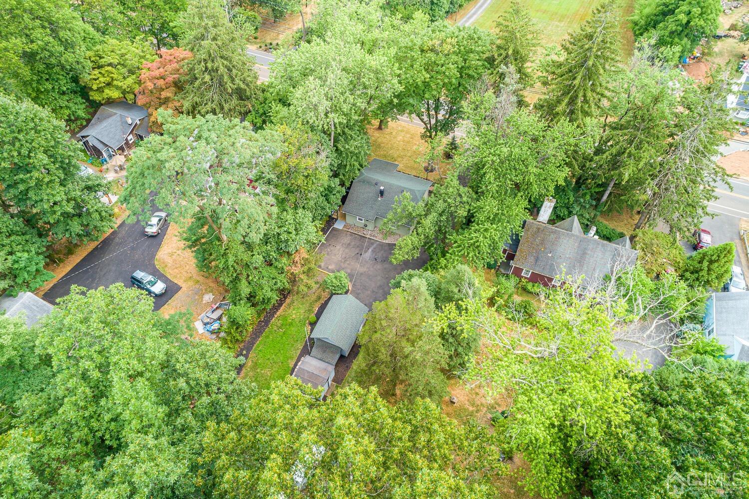 2015 Washington Valley Road Bridgewater, NJ 08836 - Photo 44 of 46 an aerial view of residential house with outdoor space and trees all around